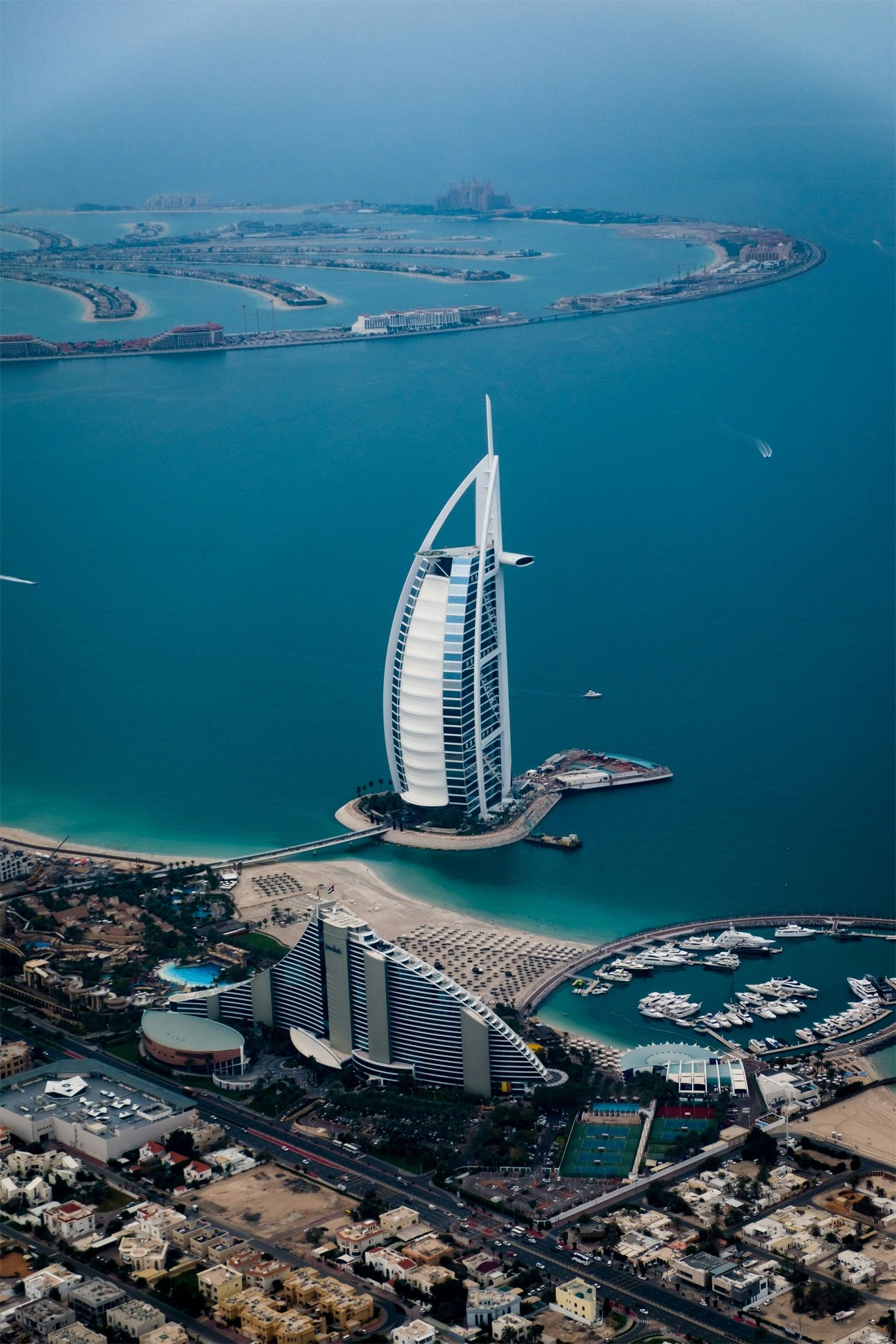 Book cheap flight to Dubai skyline with Burj Al Arab and luxury beach view